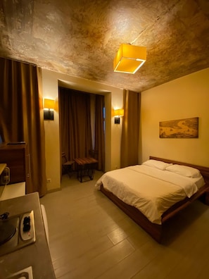 Ropa de cama de alta calidad y minibar