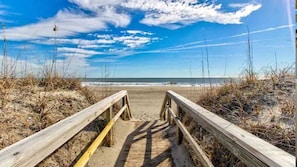 On the beach, sun-loungers, beach towels