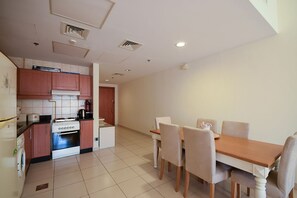 Apartamento standard, 1 quarto, acesso à piscina | Área de estar