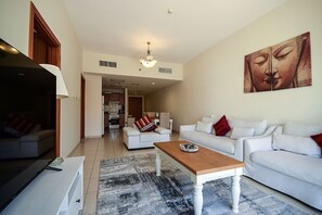 Apartamento standard, 1 quarto, acesso à piscina | Área de estar