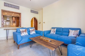 Apartamento standard, 1 quarto, acesso à piscina | Área de estar