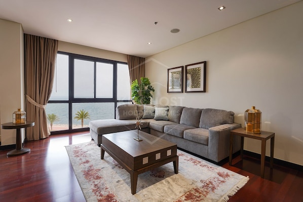Standard Apartment, 1 Bedroom, Pool Access, Sea View | Living area | 55-inch flat-screen TV with digital channels, TV - Anantara Royal Amwaj | Luxurious 1 BR-Palm Jumeirah (Dubai)