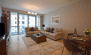 Standard Apartment, 2 Bedrooms, Pool Access, Partial Sea View | Living area - Al Fattan (Dubai)