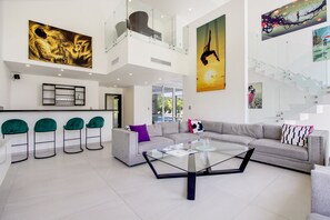 Villa | Living area | 42-inch flat-screen TV with cable channels, TV