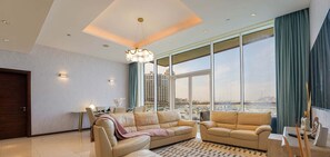 Standard-Apartment, 2 Schlafzimmer, Poolzugang, Meerblick | Wohnbereich