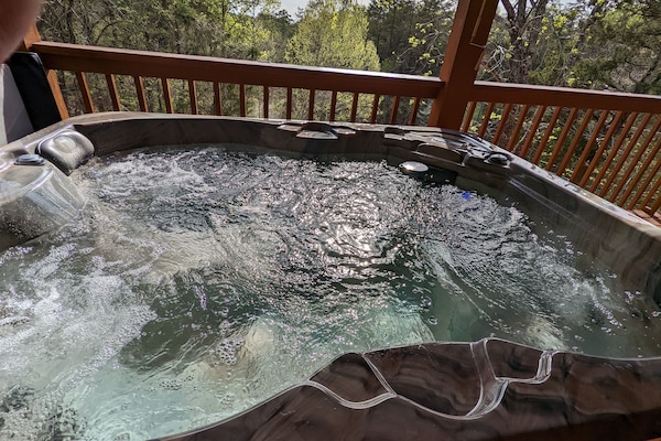 Enjoy the sunsets from the crystal clean hot tub