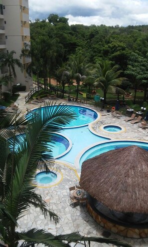 Outdoor pool, a heated pool - Thermas Paradise Apto 223 - @ThermasGoias (GO)