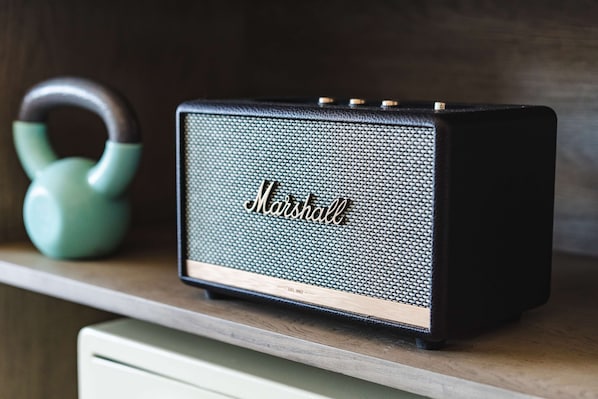 A Marshall speaker on a wooden surface. - Egyptian Motor Hotel, Bw Signature Collection (Phoenix)