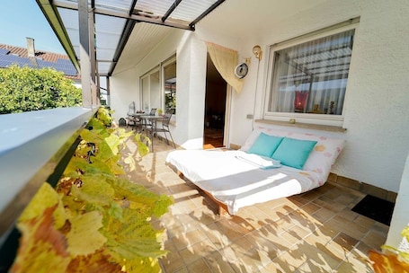 Property grounds. Large, quiet vacation apartment (approx. 70sqm) with large balcony and shared use of the garden