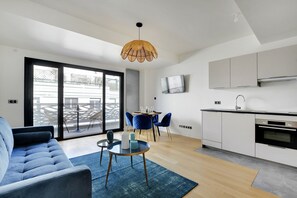 Apartment (Apartment with Shower) | Living area | 40-inch TV with cable channels, streaming services - Drawing House (Paris)
