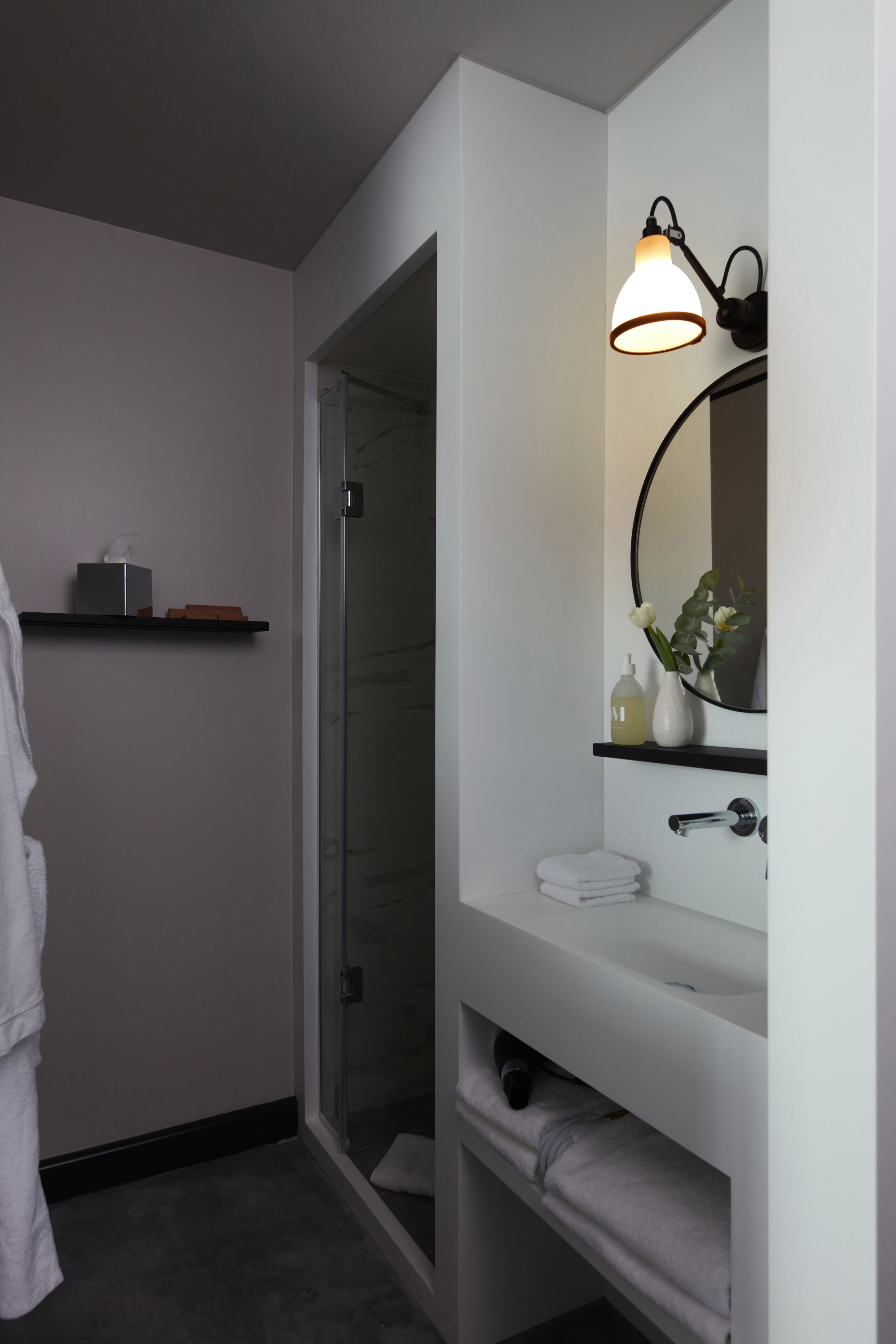 designer toiletries, hair dryer, bathrobes, slippers