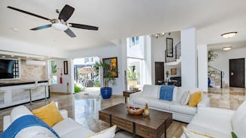 Deluxe Villa | Living area | 32-inch flat-screen TV with cable channels, TV