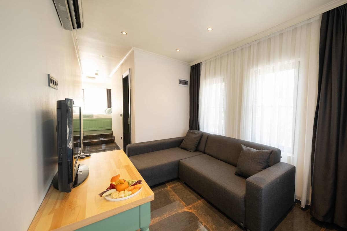 Lakosztály | Nappalirész | LED-tévé