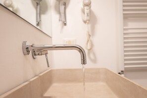 Deluxe Double Room | Bathroom | Shower, rainfall showerhead, free toiletries, hair dryer