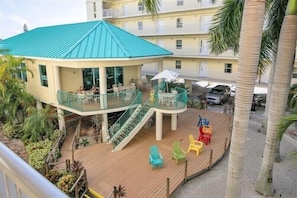 Outdoor dining - Beachfront Beauty at Sunset Vistas (Treasure Island)