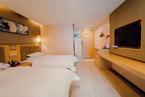 Zheng'an Manfei Hotel (Guitar Culture Squaie Branch)