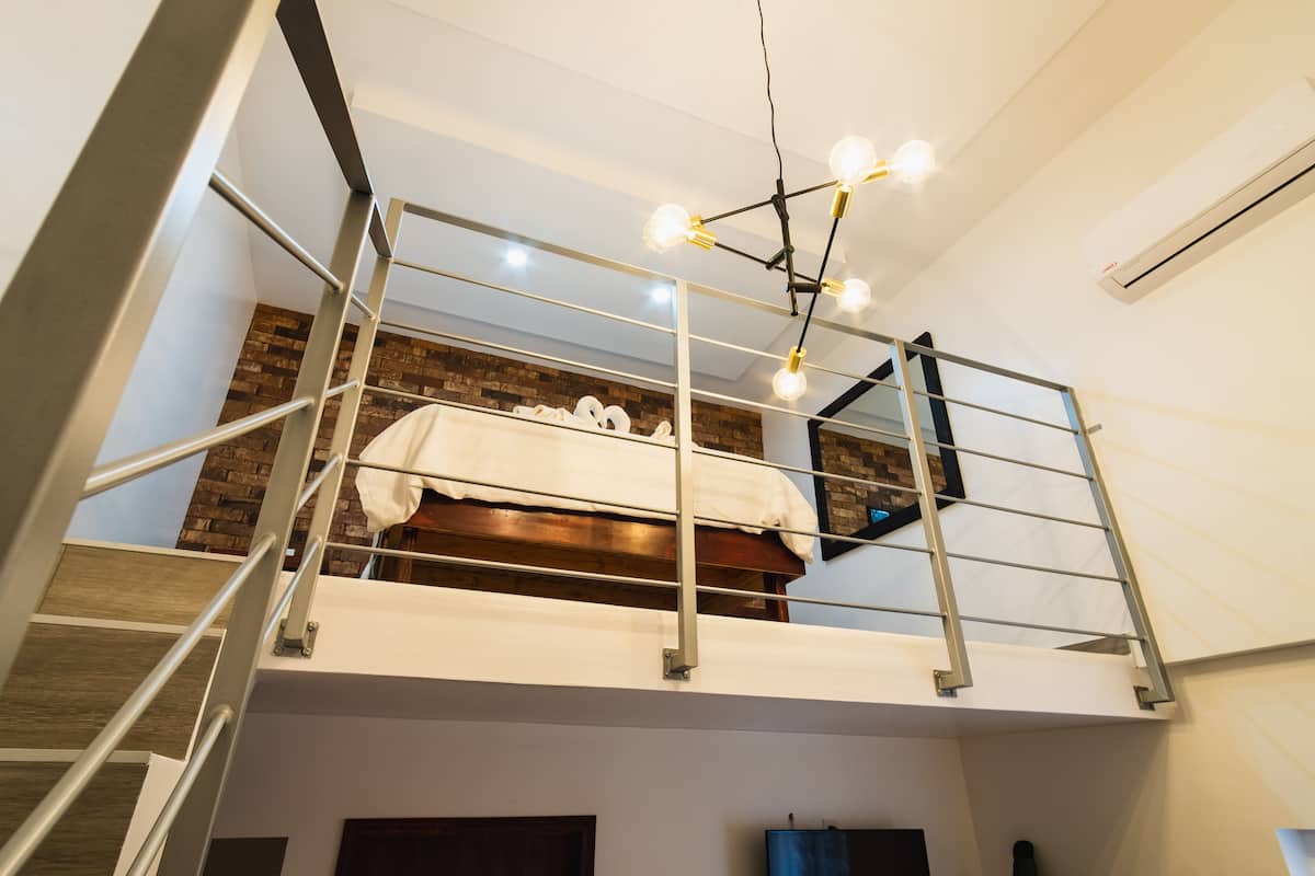 Suite junior | 1 habitación, tabla de planchar con plancha, wifi gratis y ropa de cama