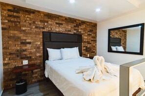 Suite junior | Tabla de planchar con plancha, wifi gratis y ropa de cama 