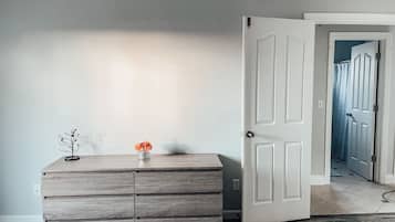 2 bedrooms, memory foam beds, iron/ironing board, travel crib