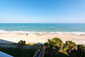 On the beach, sun-loungers, beach towels