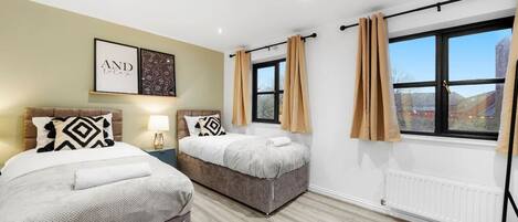 3 bedrooms, desk, iron/ironing board, travel cot