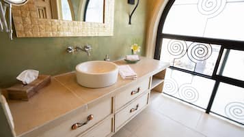 Shower, hair dryer, towels, toilet paper