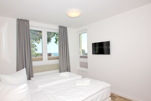 2 bedrooms, WiFi - With sea view and balcony, use of swimming pool and sauna - sea view apartment 64 - (Göhren)