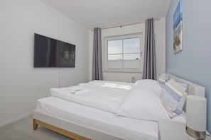 1 slaapkamer, een strijkplank/strijkijzer, wifi