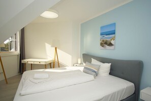 2 slaapkamers, een bureau, een strijkplank/strijkijzer, wifi