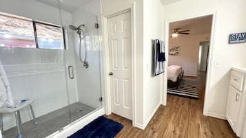 Combined shower/tub, hair dryer, towels, soap