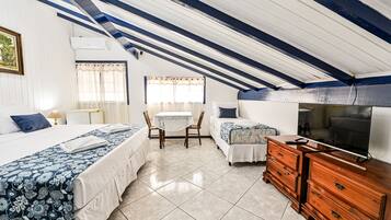 Suite Luxo Quadrupla | Frigobar, Wi-Fi de cortesia, roupa de cama