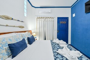 Suite Standard Triplo | Minibar, gratis wi-fi och sängkläder