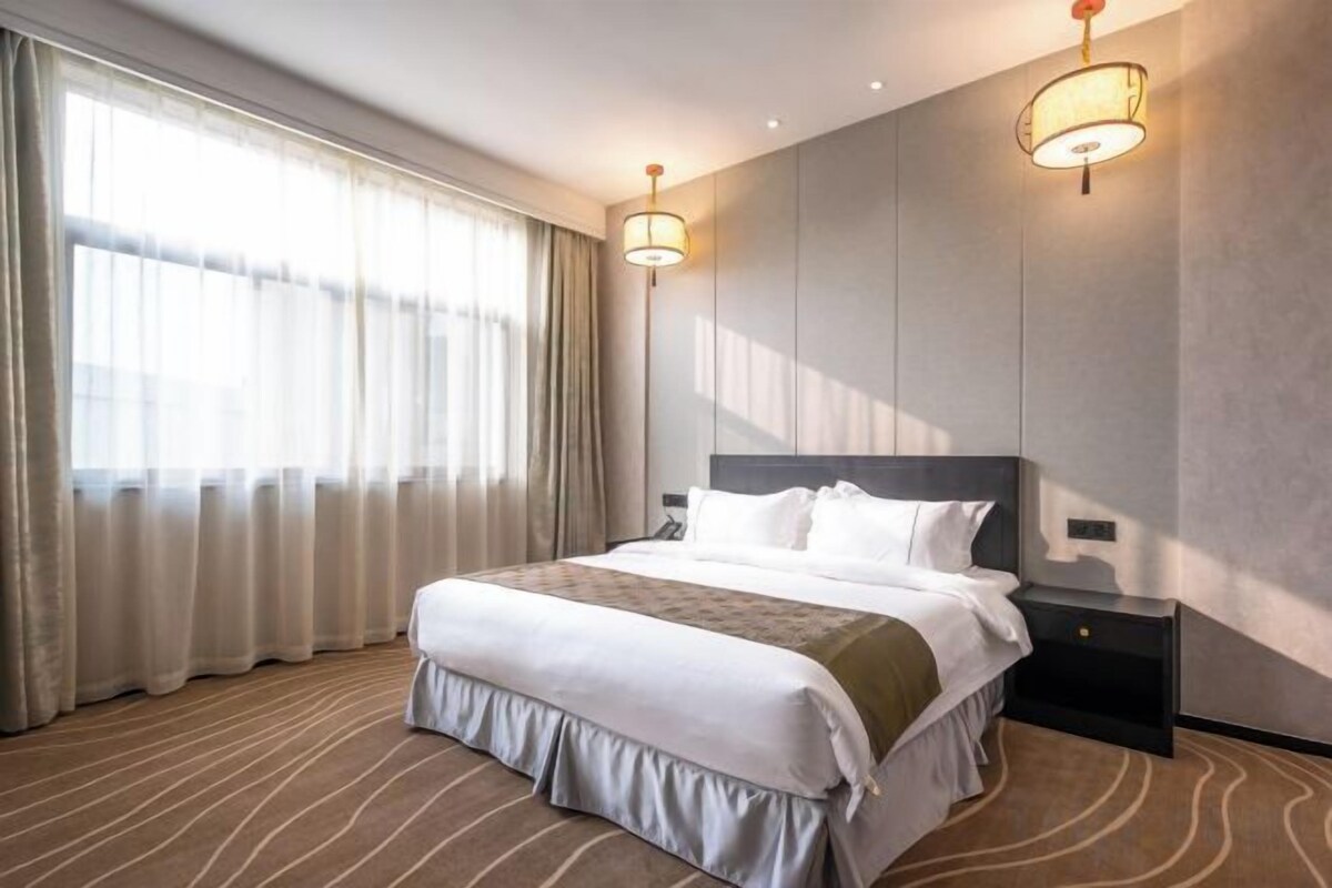 Luxe beddengoed, een bureau, verduisterende gordijnen, gratis wifi