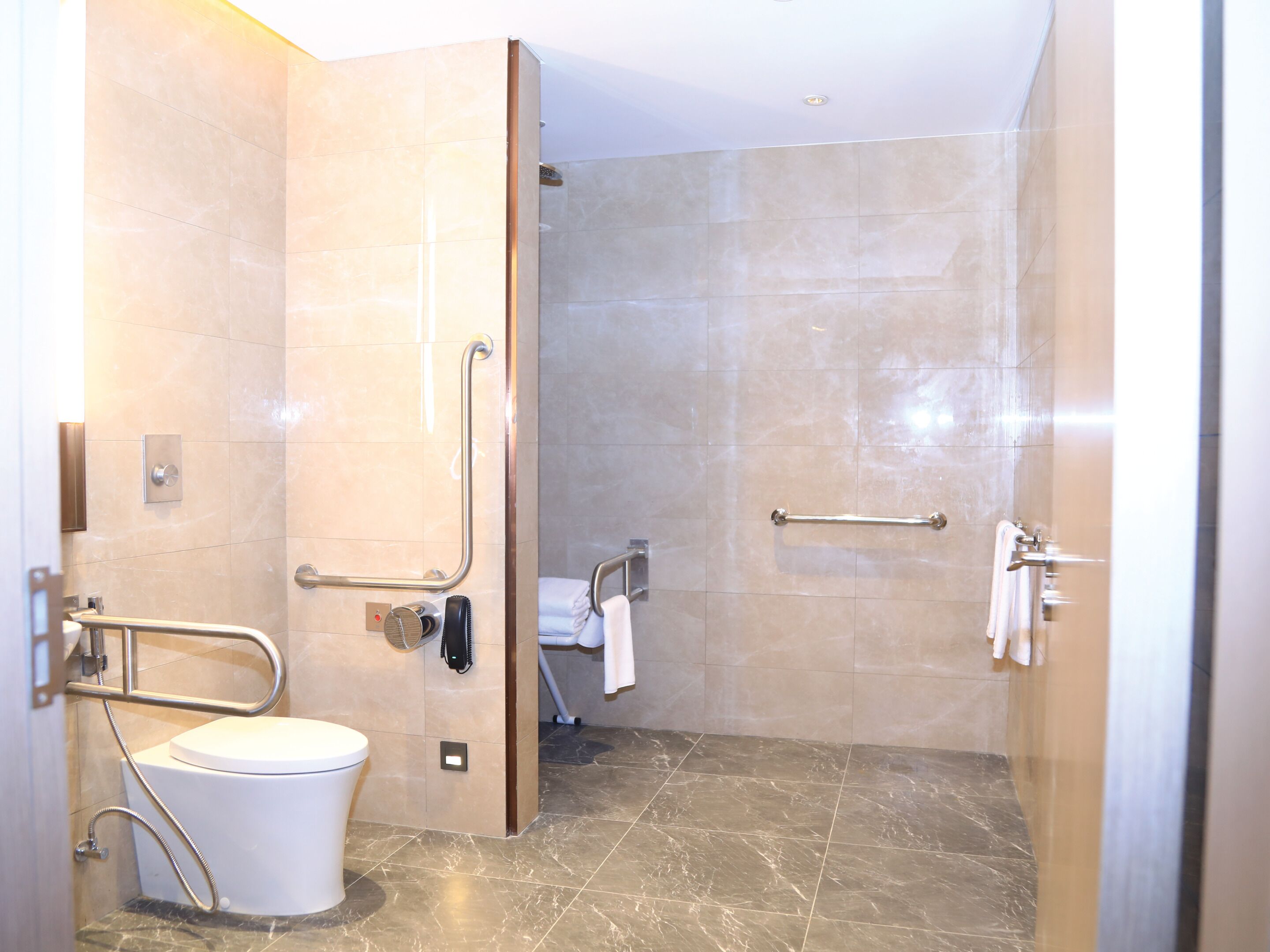 deluxe room, 1 king bed | bathroom | bathrobes, slippers, towels, soap