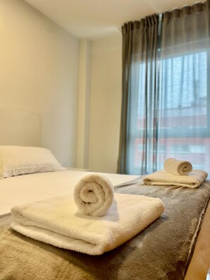 1 dormitorio, ropa de cama de alta calidad, edredones de plumas
