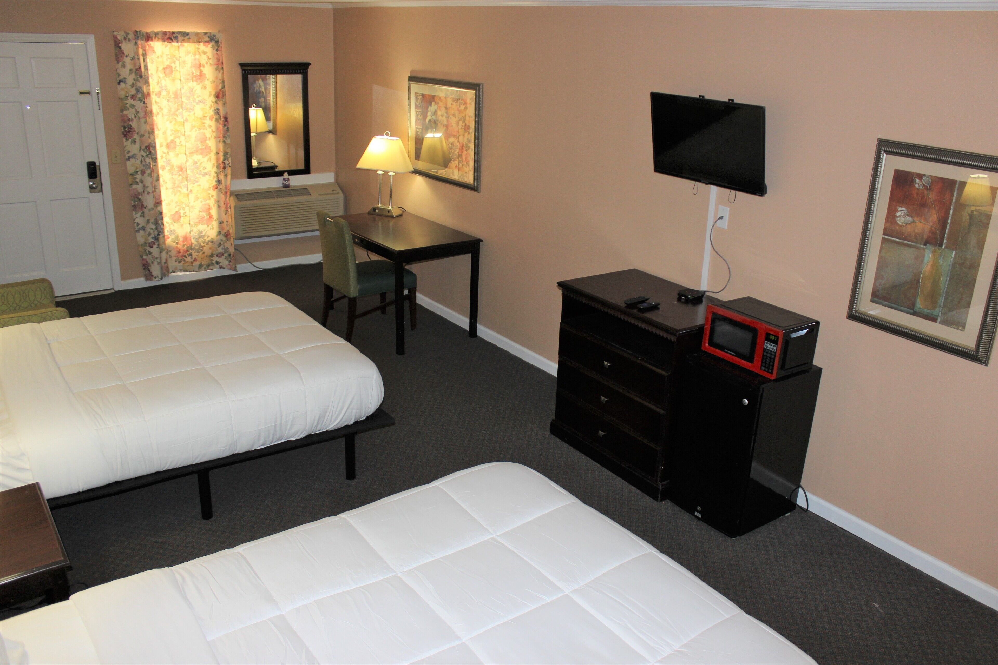 business quadruple room | premium bedding, pillow-top beds, individually decorated