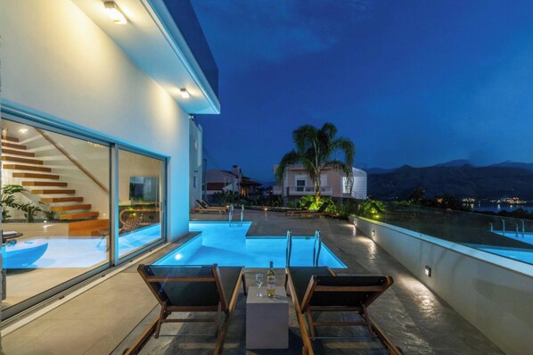 Seasonal outdoor pool, pool umbrellas, pool loungers