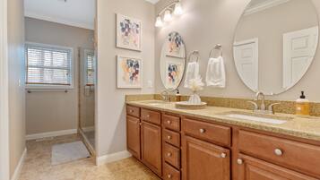 Combined shower/tub, hair dryer, towels, soap
