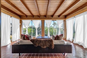 Sunroom for relaxation and entertainment. Hearing distance of the Grand Piano.