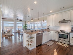 Fridge, microwave, oven, stovetop - Blue Pearl #106-Soundfront with Private Dock, Kayaks & Walkable Beach Access! (North Topsail Beach)