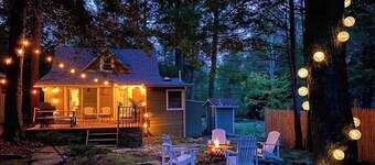 Boutique Cabin w/ Lake Access, Canoe, SUPs, Inner Tubes, BBQ, Fire Pit, Fireplace—Renovated & Chic