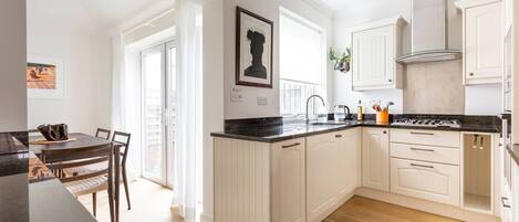 Fridge, microwave, dishwasher, coffee/tea maker