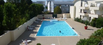 Apartment with separate bedroom south-facing terrace swimming pool view parking close to sea