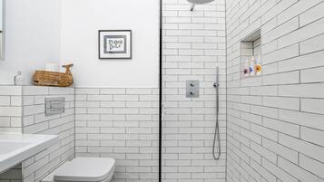 The Loft Studio | Bathroom | Designer toiletries, hair dryer, heated floors, towels