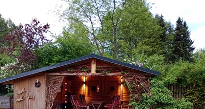 You will find a peaceful idyll and relaxation here in the Apartment-Feldsteingarten.