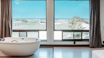 Habitación de lujo, 1 cama King size, vista al océano | Minibar, escritorio, espacio para trabajar con laptop y wifi gratis