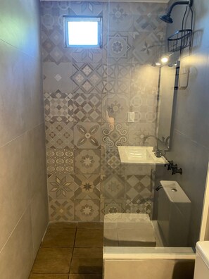 Shower, towels, soap, toilet paper