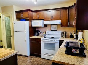 Fridge, microwave, oven, stovetop - Spacious Basement suite (Camrose)