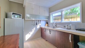 Fridge, stovetop, coffee/tea maker, toaster