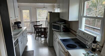 Cozy Cottage with access to and partially obstructed views of the bay.